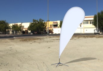 Wall Mural - Blank white teardrop bow flag outdoor advertising shield beach flag banner or vertical wind banner mock up template isolated on the beach.