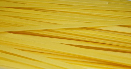 Abstract texture of fettuccine pasta