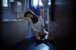 © Stocked House Studio - Girl addict unconscious sitting on the bathroom's floor