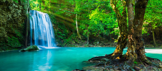 The beautiful waterfall at deep tropical rain forest.