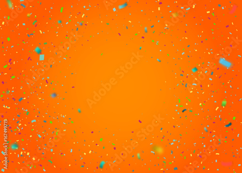 Colorful confetti falling randomly. Abstract orange background with