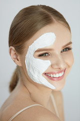 Wall Mural - Face Mask. Portrait Of Beautiful Smiling Girl With White Mask