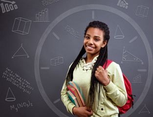 time for mathematics –smiling schoolgirl .