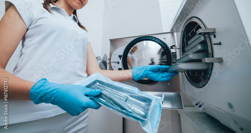 Fotomural Sterilizing medical instruments in autoclave