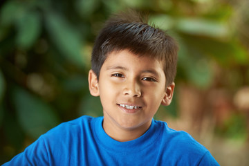 portrait of small hispanic boy
