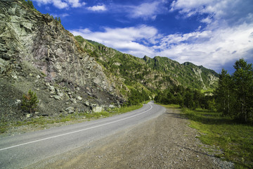 Asphalt road in the mountains of Altai