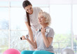© Africa Studio - Physiotherapist working with elderly patient in modern clinic