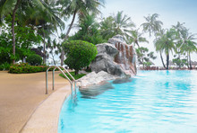 Swimming Pool On The Territory Of Tropical Hotel In Summer Day
