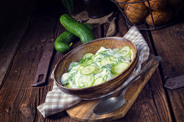 fresh cucumber salad with yogurt and young potatoes