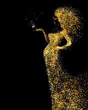 Beautiful Woman Abstract Figure Formed By Gold Color Particles On The Black Background. Bright Banner With Beautiful Glamour Girl With Hair Down And In The Long Fashion Dress.