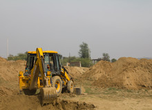 Earth Moving Equipment Near Damdama Lake In Gurgaon, Haryana (India)