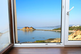 Fototapeta  - Okno współczesne z widokiem na zatokę morza Śródziemnego.
