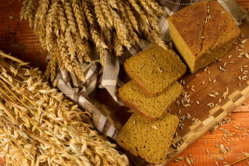 Wall Mural - Still life with rye bread, ears of corn