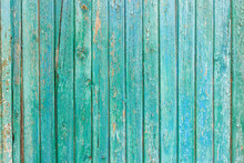 Bright Green Wooden Background With Peeling Paint And Vertical Boards