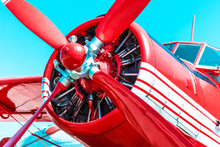 Red Retro Propeller Engine Airplane