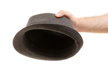 Hat in male hands isolated