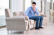 © Elnur - Young man shopping in furniture store