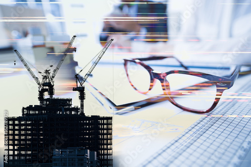 Fotografia, Obraz Building under construction and businessmen
