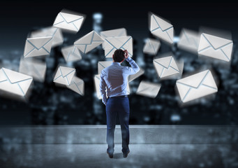Wall Mural - Businessman watching email interface on a rooftop 3D rendering