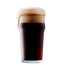 Mug Of Frosty Dark Beer With Foam Isolated On A White Background