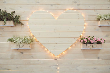 Beautiful white wedding heart decor for photo