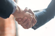 © REDPIXEL - Business people shaking hands. Finishing up meeting.