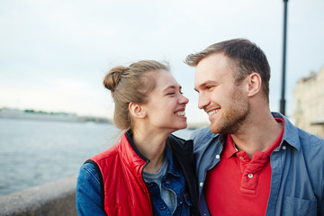 Canvas Print - Affectionate lovers looking at one another during romantic vacation