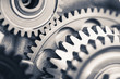 © nikkytok - engine gear wheels, industrial background