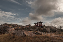 Swedish Cabin On The Rocks Standing