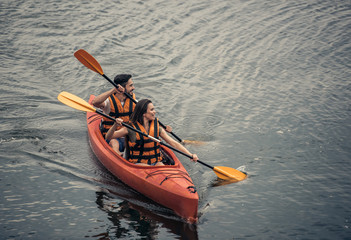 Wall Mural - Couple travelling by kayak