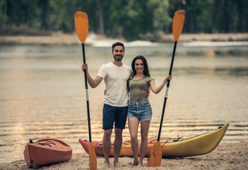 Wall Mural - Couple travelling by kayak