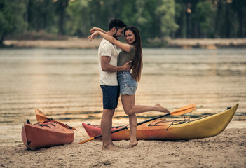 Wall Mural - Couple travelling by kayak