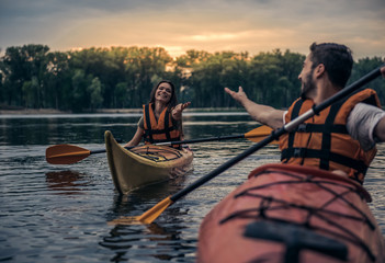 Wall Mural - Couple travelling by kayak