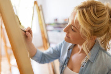 Sticker - woman artist with pencil drawing at art school