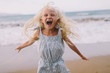 © Evgenij Yulkin/Stocksy - Little girl screaming into the camera