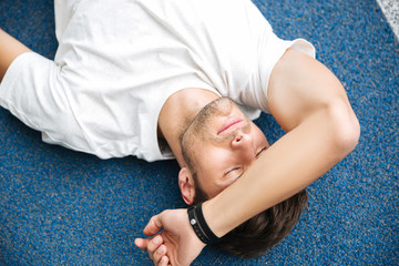 Sticker - Exhausted sportsman finished his race and resting