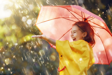 Wall Mural - child with red umbrella