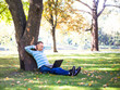 © lkoimages - Happy student study with laptop in city park