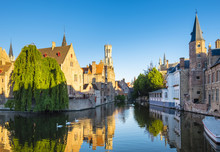 Belgium, West Flanders (Vlaanderen), Bruges (Brugge). Belfort Van Brugge And Medieval Buildings On The Dijver Canal From Rozenhoedkaai At Dawn.