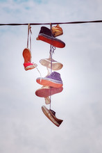 Old Shoes Hang On Wire, Color Toning Applied.