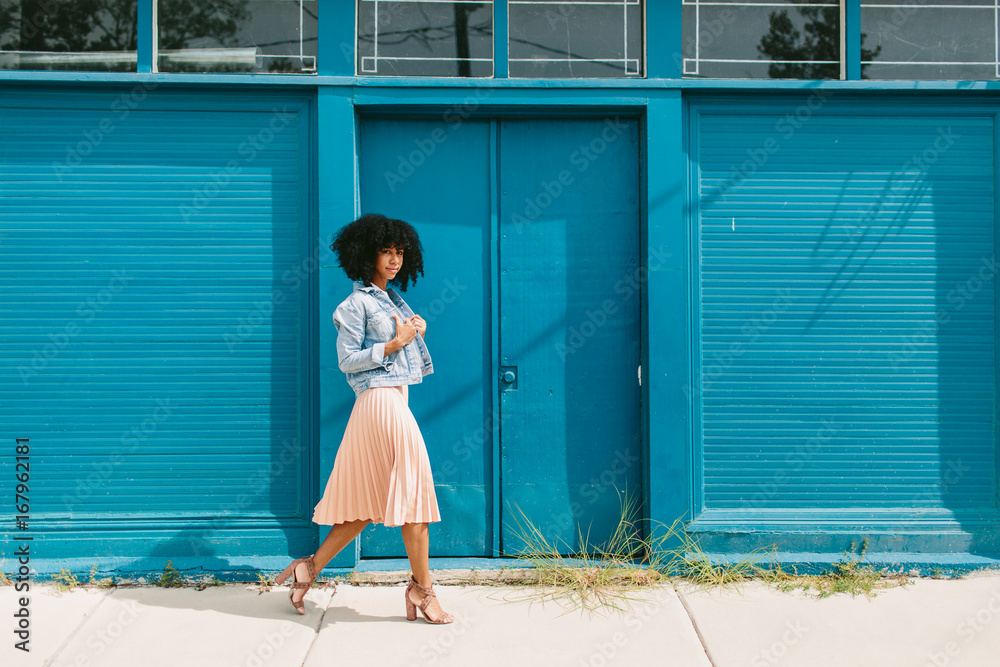 Portrait of a beautiful young black woman posing outdoors Stock Photo ...