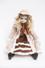 Ceramic Porcelain Handmade Blond Doll With Textile Hat And Brown Dress
