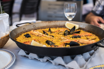 Paella recipe for two in traditional pan, recipe from Mediterranean