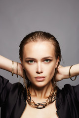 Wall Mural - beautiful woman with wet hair and make-up