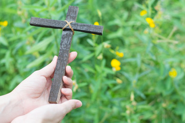 Wall Mural - Wood cross or religion symbol shape over wood  background for God, Christ, Christianity, religious, faith, holy, spiritual, Jesus, belief or resurrection, dust as christian religion, 