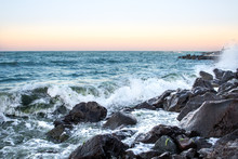 Sea Waves In Sunset With Rocks And Stones. Nature Landscape.