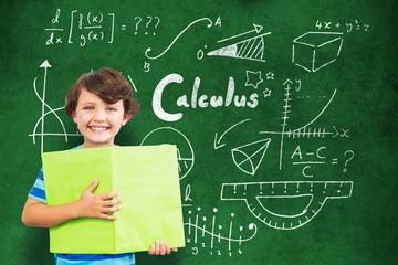 Poster - Composite image of portrait of smiling boy holding green book