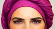 © Artem Markin - Beautiful European woman in a bright pink turban and beautiful makeup . The style of urban fashion.