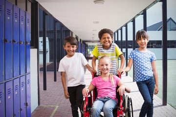 Sticker - Composite image of cute disabled pupil smiling at camera with he