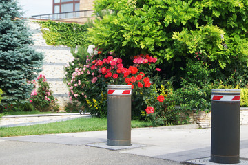 Parking automatic lifting bollards